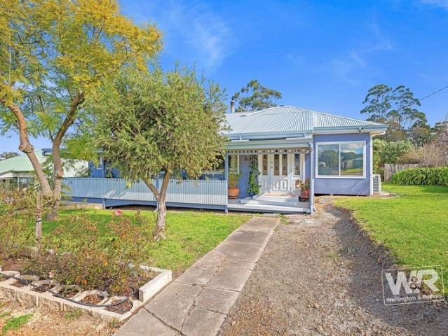 BEAUTIFULLY RENOVATED HOME AMONG TRANQUIL GARDENS