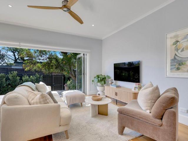 BEAUTIFULLY RENOVATED HOME FULL OF NATURAL LIGHT