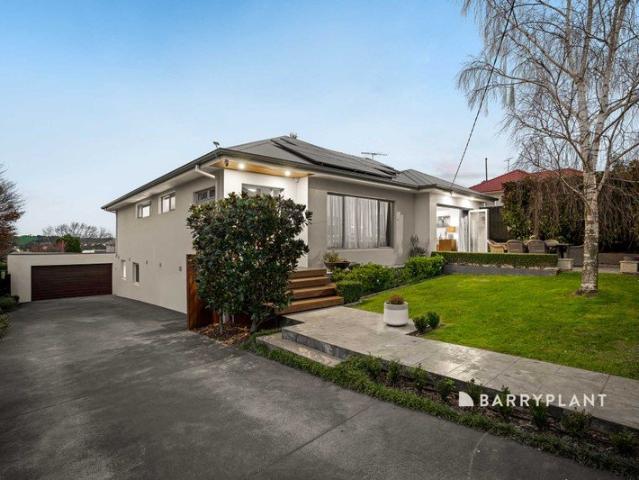 Beautifully Renovated Home in a Private, Walk to Town Location