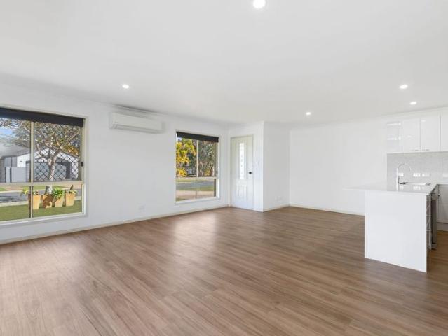Beautifully Renovated Single Level Duplex