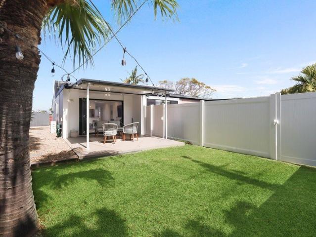 Beautifully Renovated Single Level Duplex with Yard