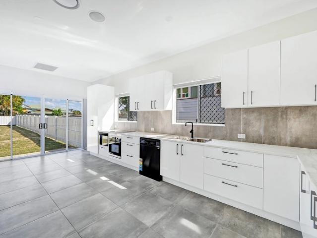 Beautifully Renovated Queensland Cottage with Huge Shed & Side Access!