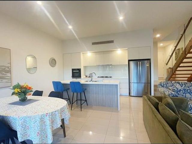 Beautifully Renovated Waterfront Home in Prestigious Hope Island