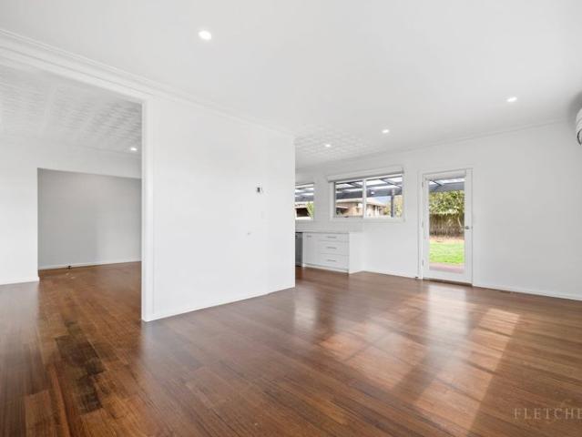 Beautifully Renovated with Unrivalled Six Car Garaging