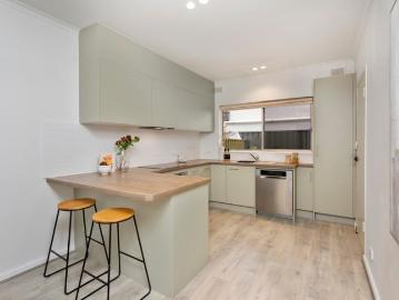 Beautifully Renovated Two Bedroom Unit in a small group of five only