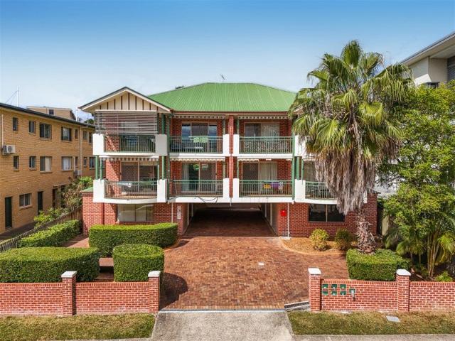 Beautifully Renovated Unit with Private Rear Access