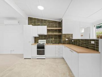 Beautifully Renovated Unit in the Heart of Town