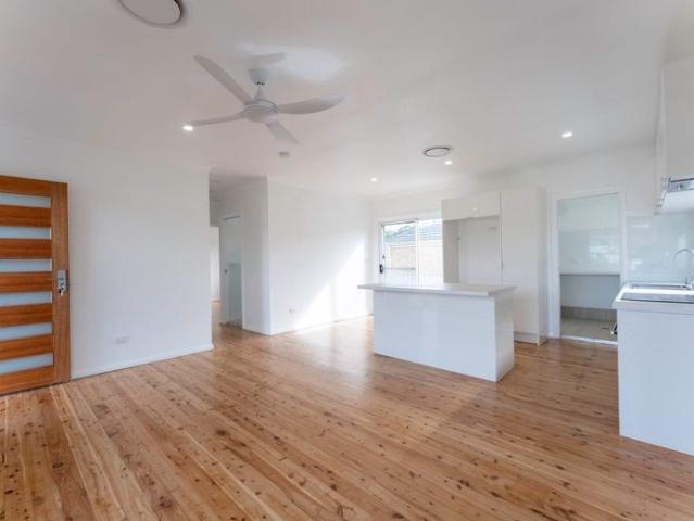 Beautifully Refurbished Home with Sun Filled Living