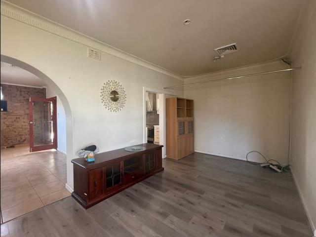 Beautifully Refreshed 3 Bedroom Home with Solar Panels – Close to the City!
