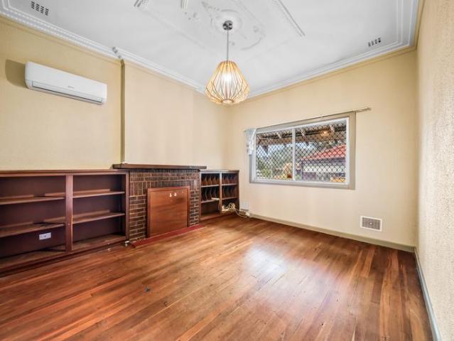 Beautifully Refreshed Character Home with Solar & Huge Enclosed Workshop