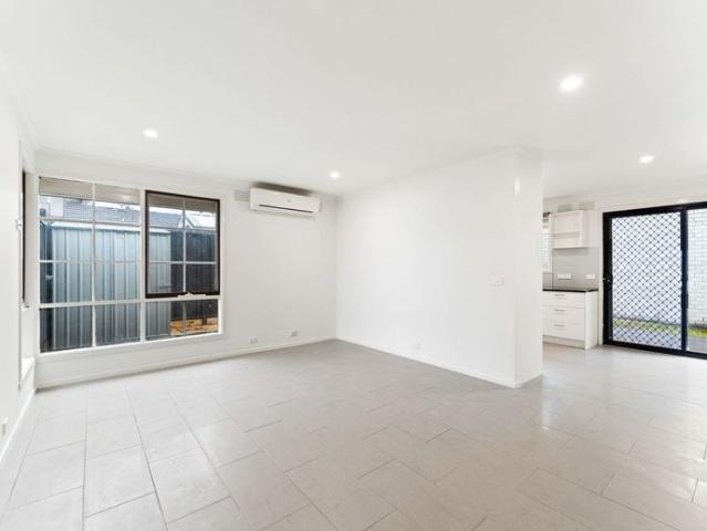 Beautifully Refreshed Three Bedroom Home with Low Maintenance Living