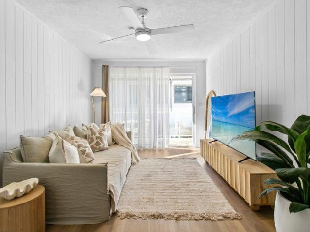 Beautifully reimagined beachside living in boutique block