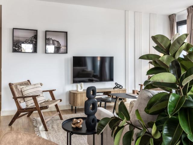 Beach Themed 3 Bedroom Apartment with Terrace and Workspace in Chueca, Madrid Amsterdam Apartments for Rent