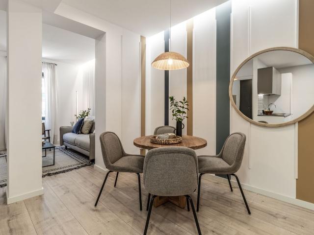 Beach Themed 1 Bedroom Apartment with AC and Workspace in Arapiles, Madrid Amsterdam Apartments for Rent