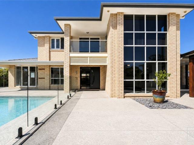 Beach Across the Road, Resort Style Pool & Exceptional Family Living
