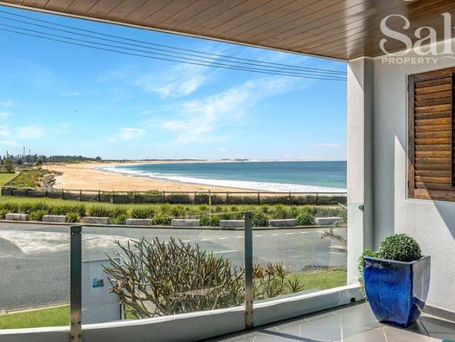 Beach front Living with Unbeatable Coastal Views