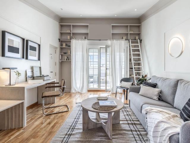 Beach Inspired 1 Bedroom Apartment with Spacious Terrace and Workspace in Chueca, Madrid Amsterdam Apartments for Rent