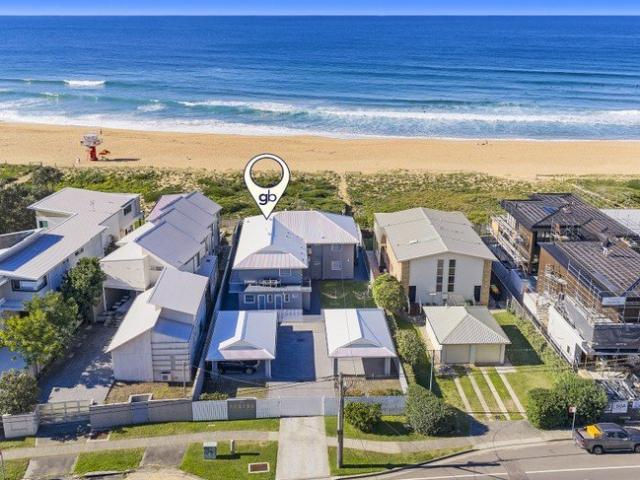 BEACHFRONT APARTMENT WITH HEADLAND TO HEADLAND OCEAN VIEWS