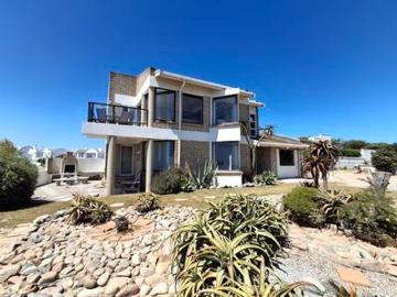 beachfront home on the pristine gold.