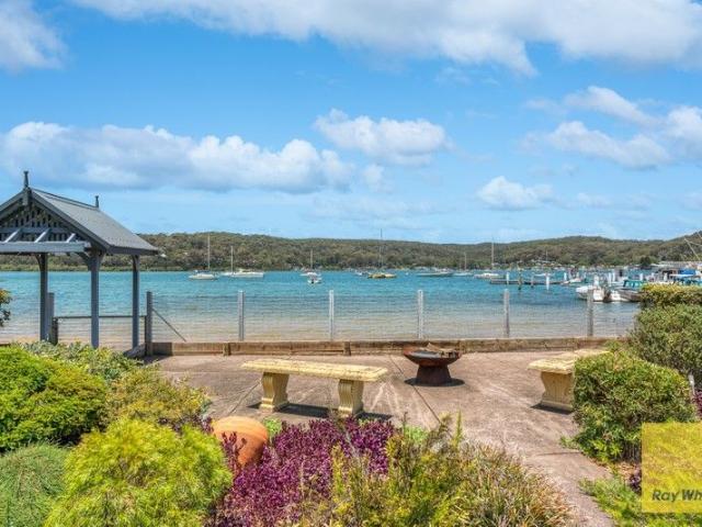Beachfront Home Offering Grand Interiors, Panoramic Water Views and Unmatched Coastal Living
