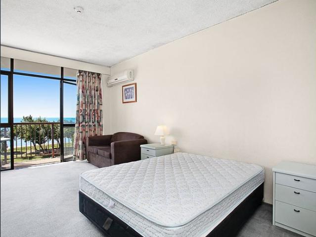 Beachfront setting with Magnetic Island views