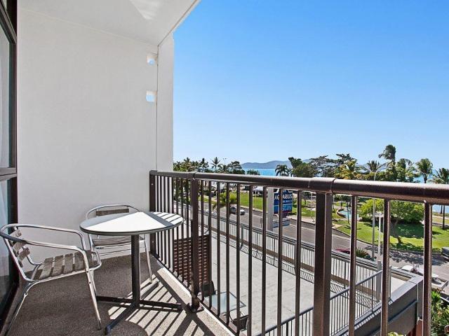 Beachfront setting with Magnetic Island views