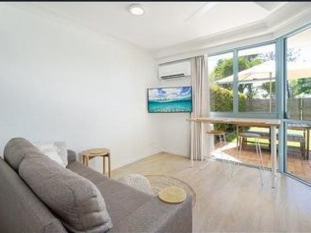 BEACHFRONT UNIT WITH PRIVATE COURTYARD
