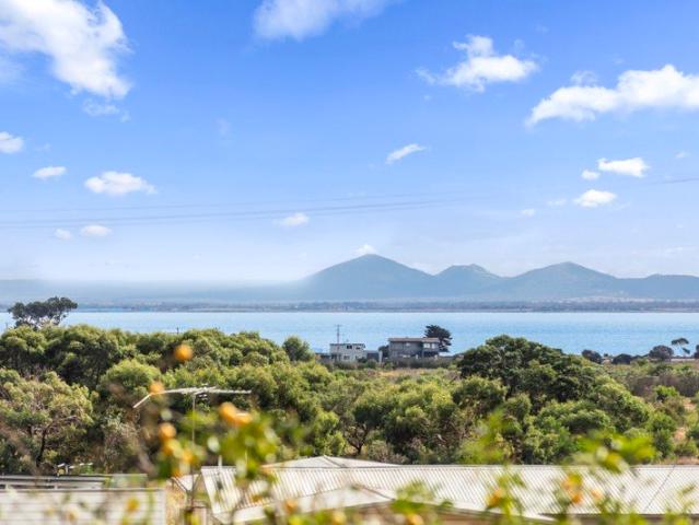 Beachside Beauty with Water Views & Scope for Future Redevelopment