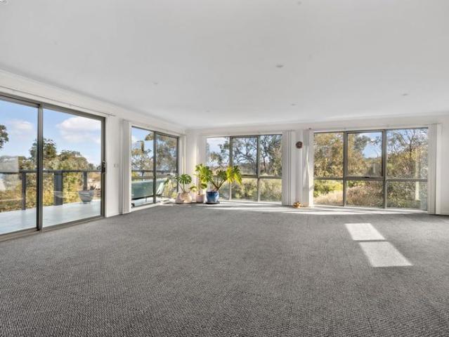 Beachside Bliss with Breathtaking Water Views Spacious Coastal Living