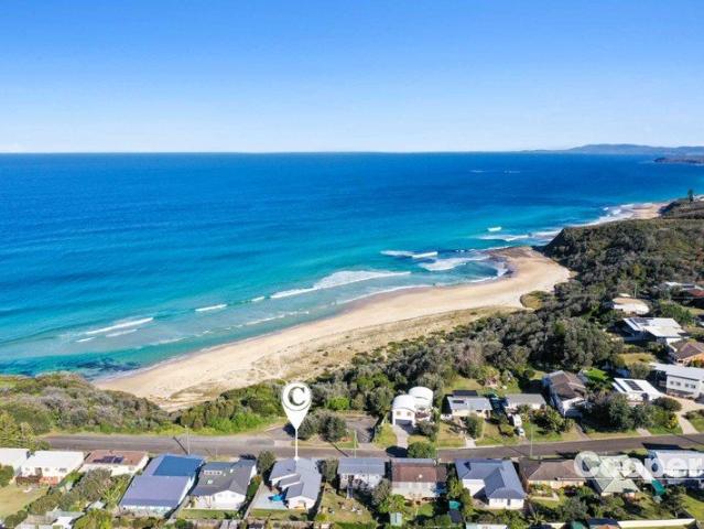 Beachside Dual Living with Ocean Views & Proven Income Potential