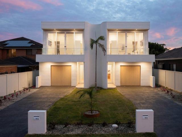 Beachside elegance and opulence with escarpment views