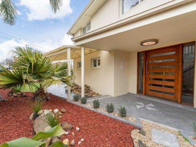 Beachside Family Home with Bay Views *Unfurnished