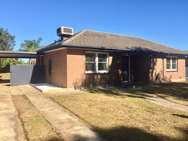 Beachside Living in a Beautifully Renovated Three Bedroom Home