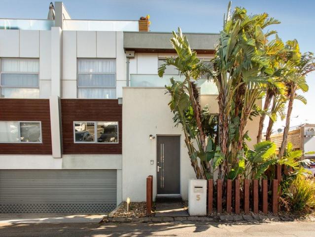 Beachside Living with Space, Style & Rooftop Views