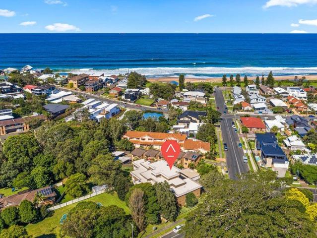 Beachside Living with Park Views