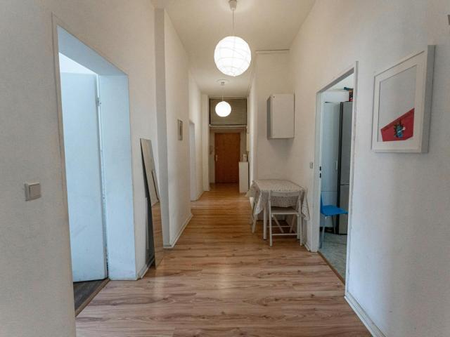Bed in a homely twin bedroom, in Tiergarten
