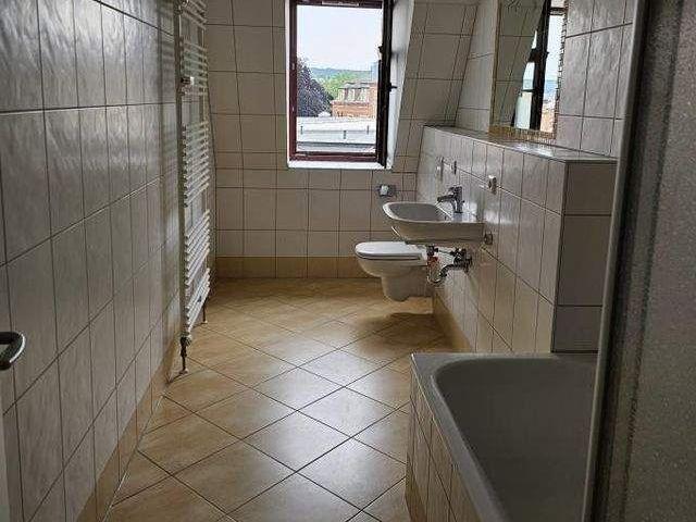 Beeindruckende Dachwohnung mit großer Küche und optimaler Raumaufteilung!