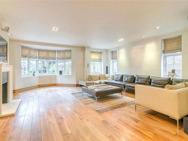 Behind gates is a substantial, detached home on one of Hampstead Garden Suburbs most prestigious roads. The house offers spectacular family accommodation and is presented in immaculate condition