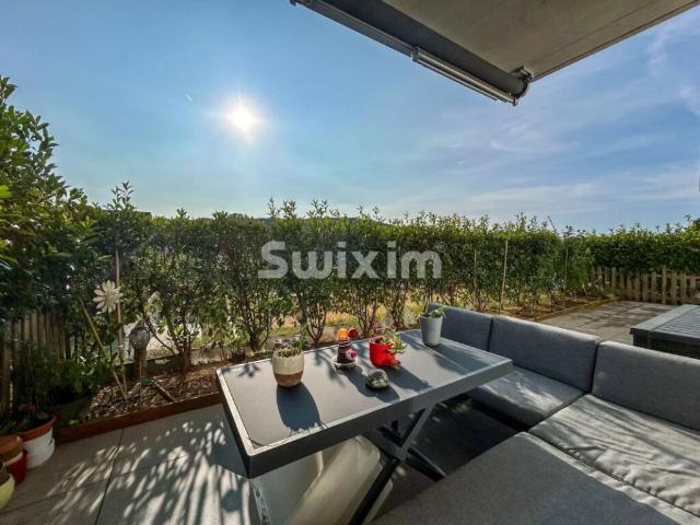 Bel appartement 3.5 pièces en rez de chaussée avec terrasse privative