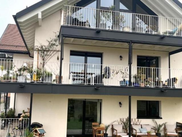 Bel appartement de 3,5 pièces avec balcon et jardin