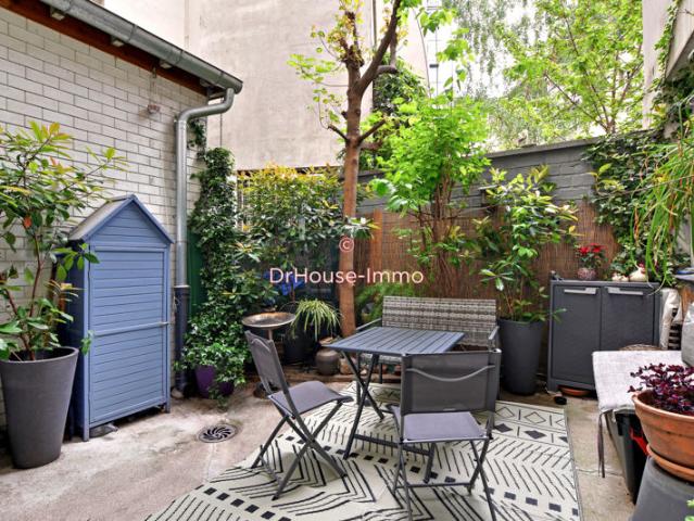 Bel appartement de 42 m² et sa cour privative arborée de 20 m²