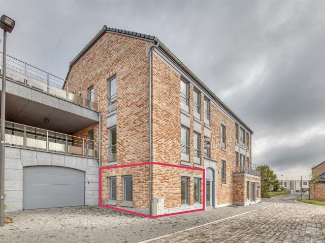 BEL APPARTEMENT NEUF + 80 M² AU REZ DE CHAUSSÉE AVEC UN PARKING à louer à ANS 4430 | Immobilière Dominique Tavolieri