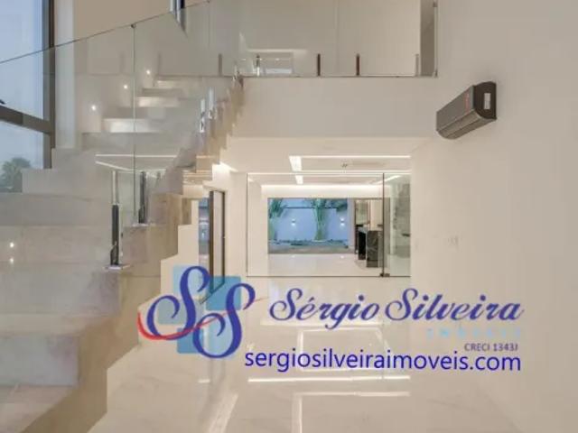 Belíssima casa na Cidade Alpha com 4 suítes