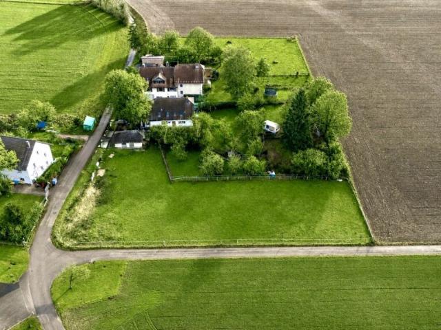 Belle maison avec appartement indépendant et terrain de 4'500 m2