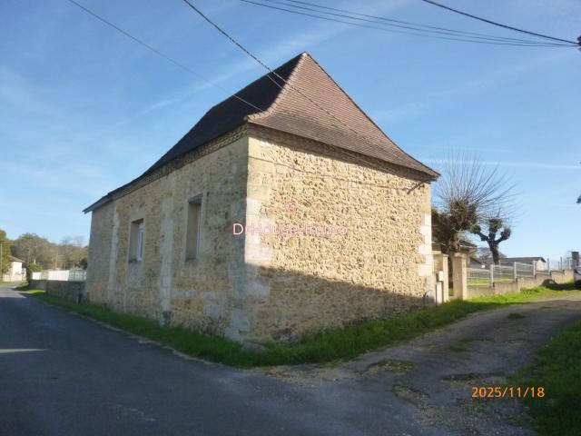 Maison en pierre avec grand terrain