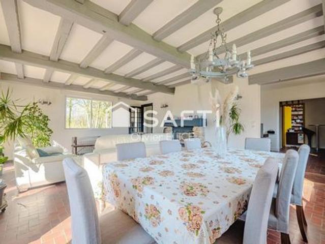Belle maison dans son écrin de verdure