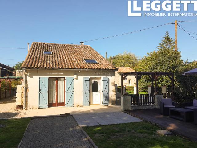 Belle maison en pierre avec jardin