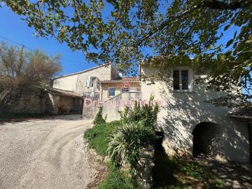 Belle maison Quercynoise de 7 pièces avec grange et 5 ha de terrain