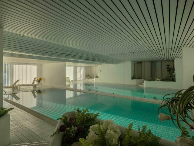 BELLISSIMO 1.5 A REDDITO CON GIARDINO E PISCINA A MORCOTE