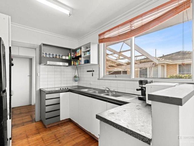 Belmont Entry Opportunity: A Solid Home with Endless Potential!